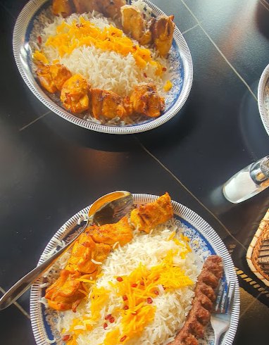 Chicken kebab and koobideh on saffron rice
